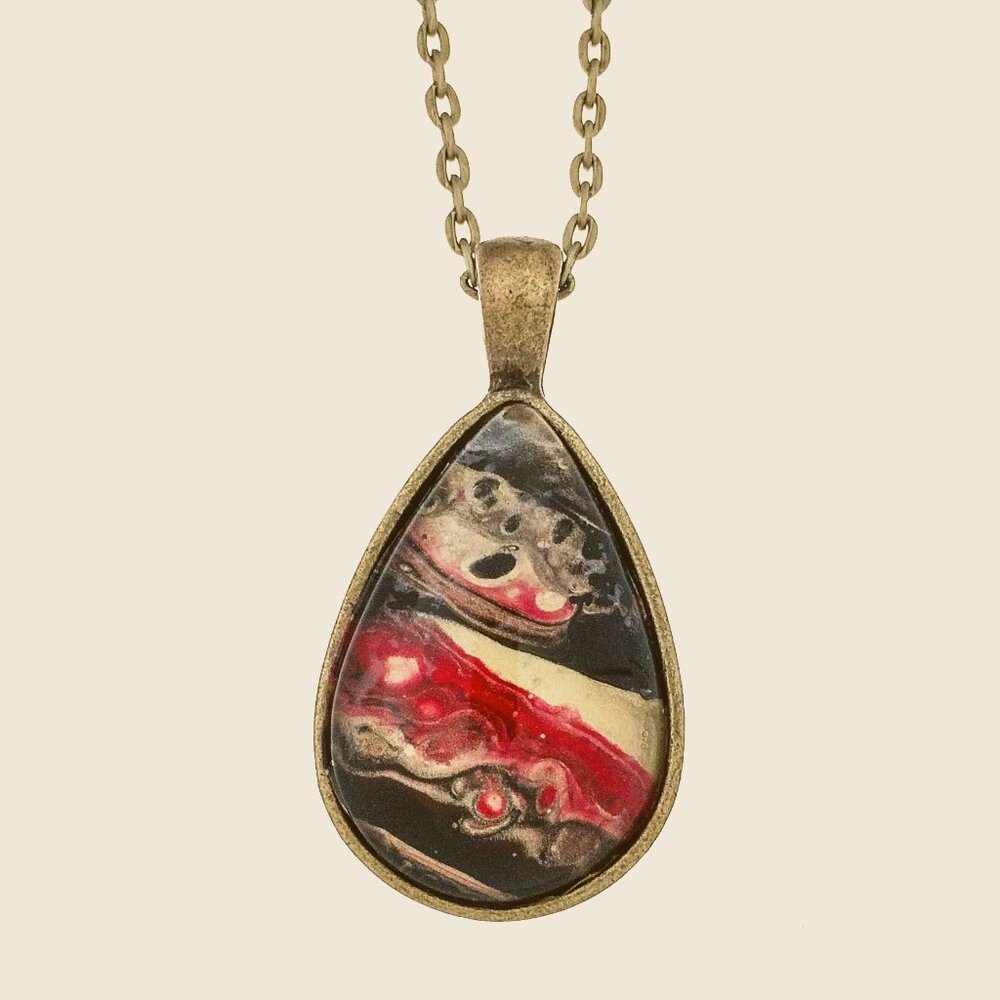 Handmade Abstract Pendant Necklace – Red, Gold & Black in a Brass Oval Frame